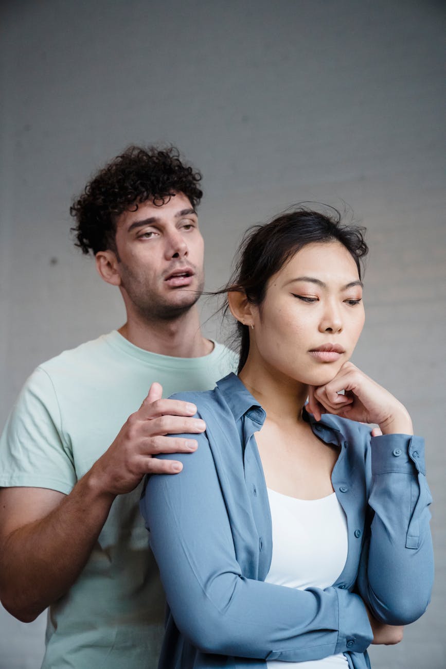 A close-up of a couple's hands gently touching, symbolizing intimate connection and building shared romantic tension.